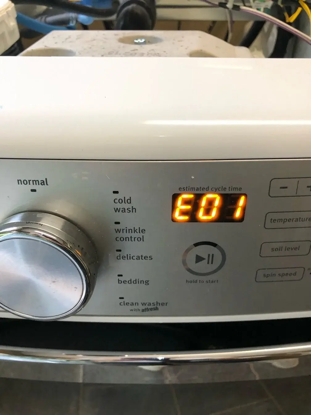 Mr. Fixer technician repairing a Electrolux appliance