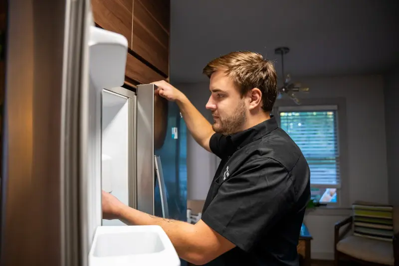Mr. Fixer technician: refrigerator repair