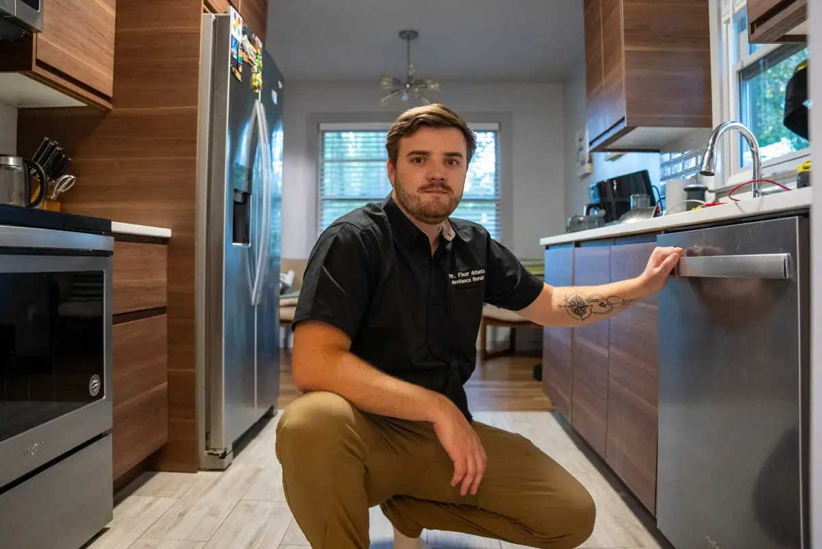 Mr. Fixer technician in an Atlanta kitchen